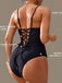 Schwarzer, einteiliger Badeanzug im Stil der 1950er Jahre mit tiefem V-Ausschnitt und Bauchkontrolle – Vintage-Badeanzug im Pin-up-Stil, klassisch schwarz