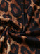 Detail: Leoparden-Spitzenbody mit Schürze im Stil der 1980er Jahre, Retro-Design, perfekt für Vintage-Modeliebhaber