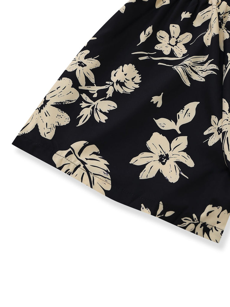 Schwarzer Stoff mit beigefarbenem Blumenmuster