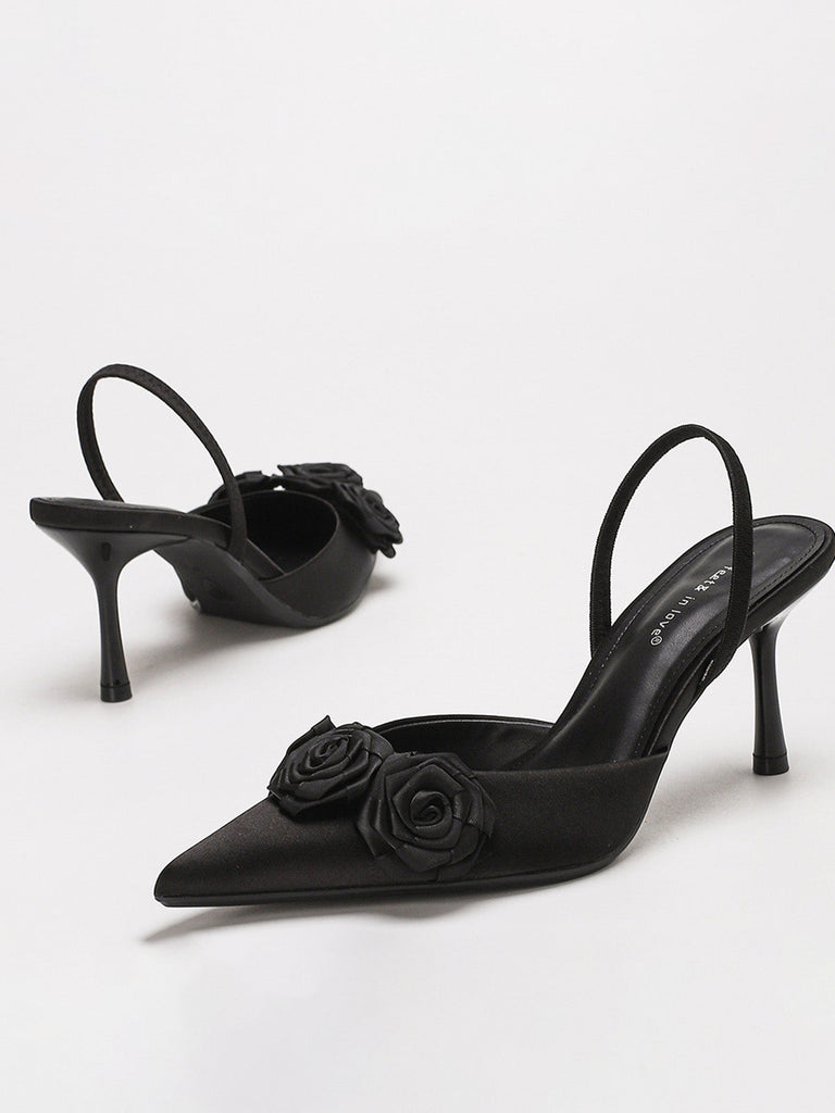 Schwarze, einfarbige Pumps mit 3D-Rosenmuster und spitzer Zehenpartie