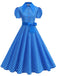 Vintage-Swingkleid mit Polka-Dots, Gürtel und Hemdkragen im klassischen Retro-Stil der 1950er Jahre.