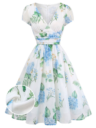 Blaues 50er Swingkleid mit Blumen-Print und V-Ausschnitt