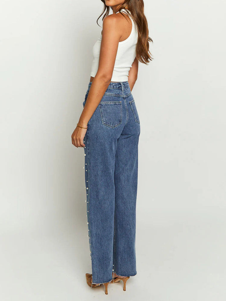Blaue Vintage-Jeans im Stil der 1960er Jahre mit gekreuzten Trägern – Vintage-Mode, Retro-Stil