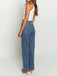 Blaue Vintage-Jeans im Stil der 1960er Jahre mit gekreuzten Trägern – Vintage-Mode, Retro-Stil