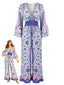 Blauer 70er Boho-Jumpsuit mit Streublumen und Trompetenärmeln
