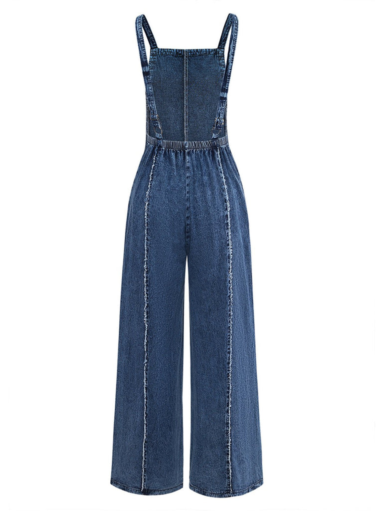 Weite, blaue Denim-Latzhose aus den 1970er-Jahren mit ausgefransten Kanten für einen klassischen, retro-inspirierten Streetwear-Look