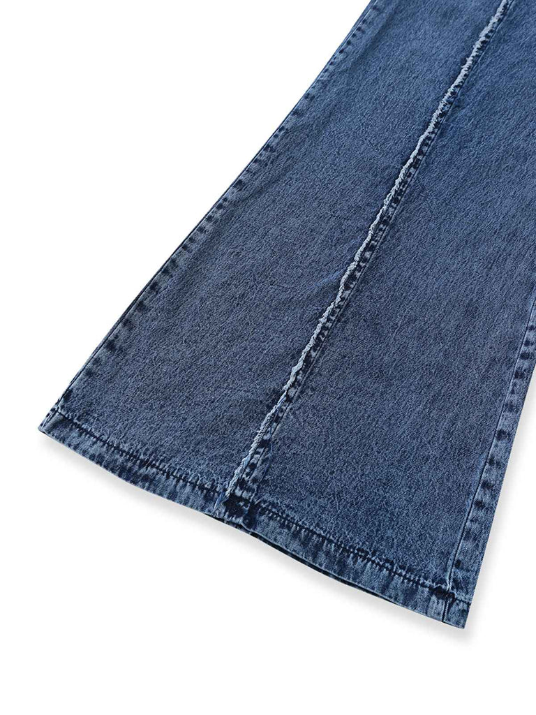 Weite, blaue Denim-Latzhose aus den 1970er-Jahren mit ausgefransten Kanten für einen klassischen, retro-inspirierten Streetwear-Look