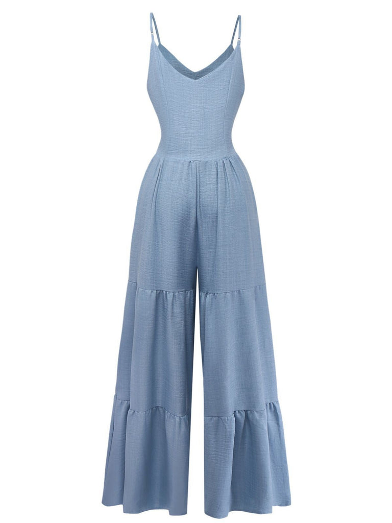 Blauer, einfarbiger Jumpsuit aus den 1930er Jahren mit tiefem V-Ausschnitt, Stufenrock und Raffungen, Rückansicht