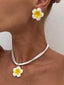 Schmuckset mit Blumenanhänger und Ohrsteckern