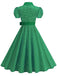 Vintage-Swingkleid mit Polka-Dots, Gürtel und Hemdkragen im klassischen Retro-Stil der 1950er Jahre.