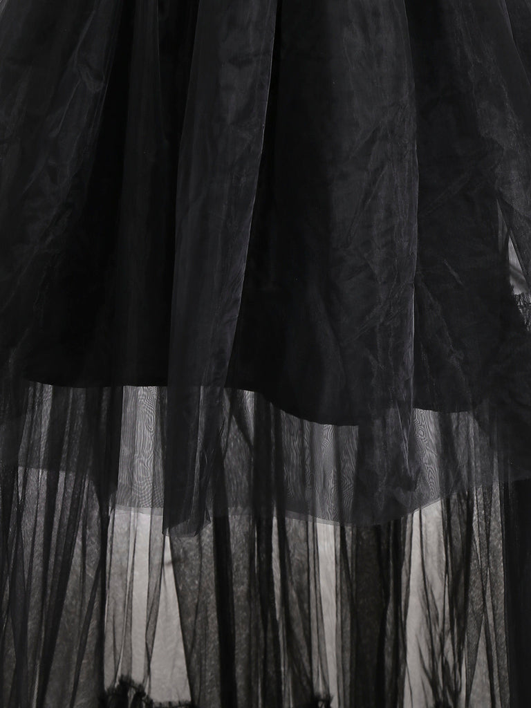 Schwarzes trägerloses 80er Meshkleid in Schleifenoptik mit Vokuhila-Saum