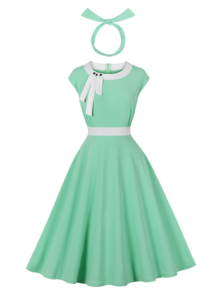 Grünes 50er Swingkleid mit Kappärmel und Schleife