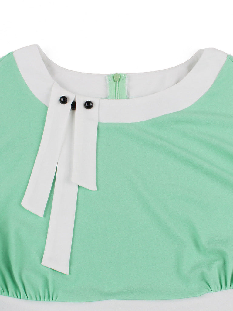 Grünes 50er Swingkleid mit Kappärmel und Schleife