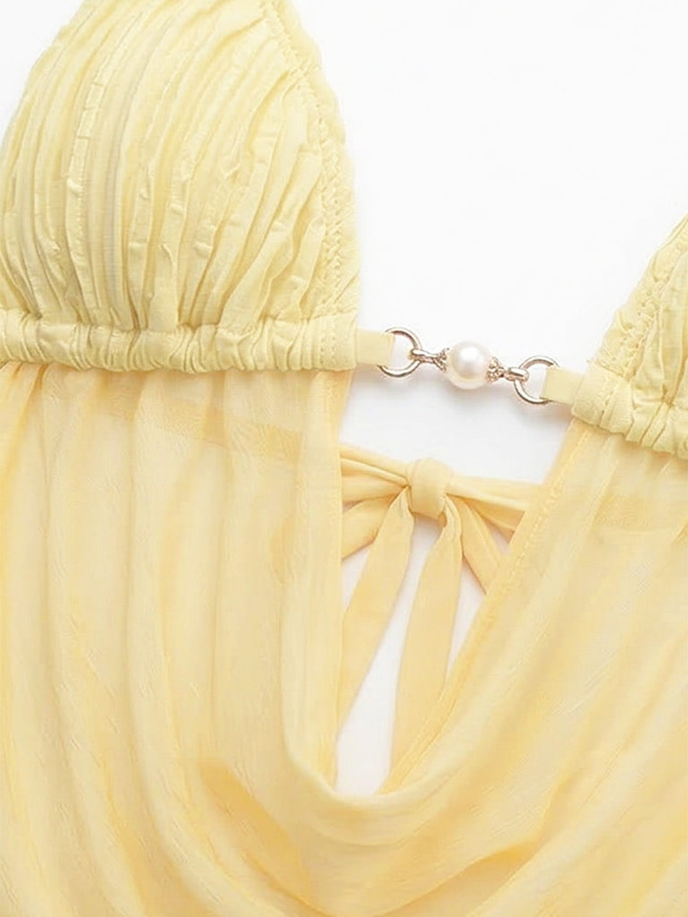 Hellgelber geraffter Bikini im Stil der 1980er Jahre – Vintage-Mode, Retro-Stil