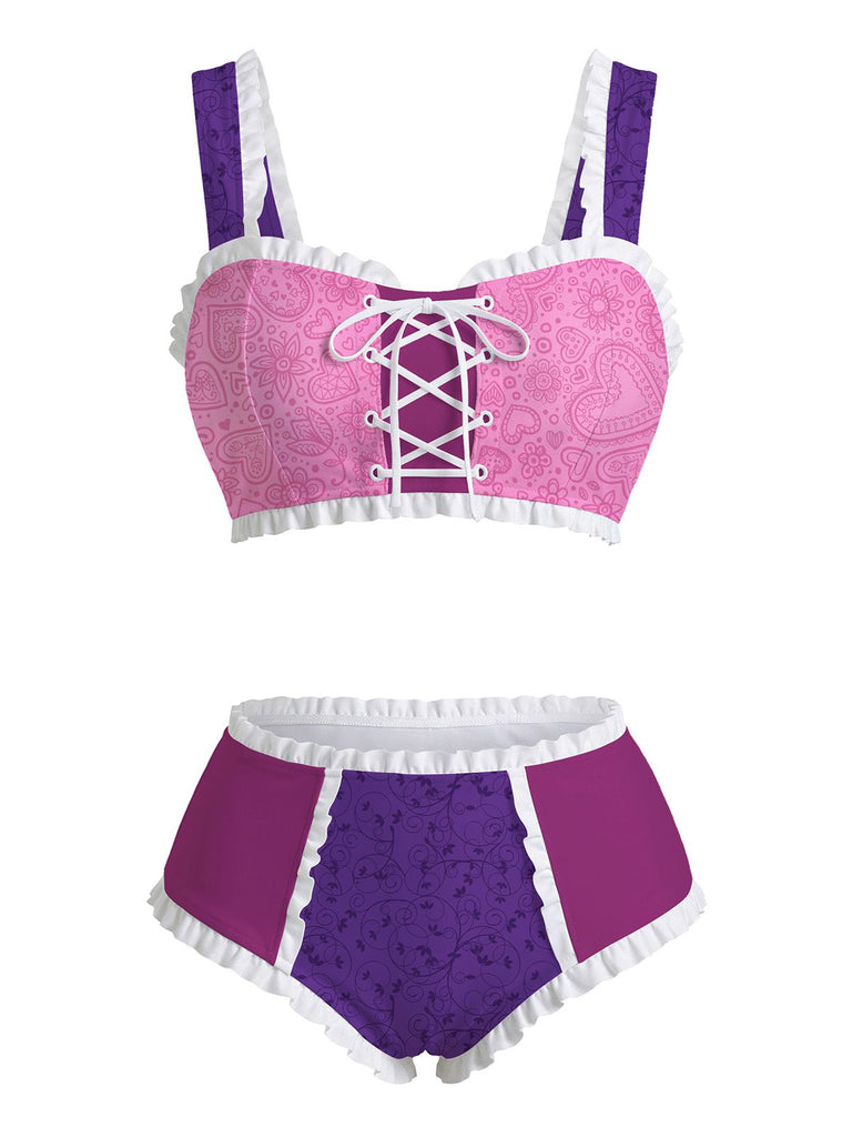 Lila-rosa Dessous-Set mit Spitzendetails auf weißem Hintergrund