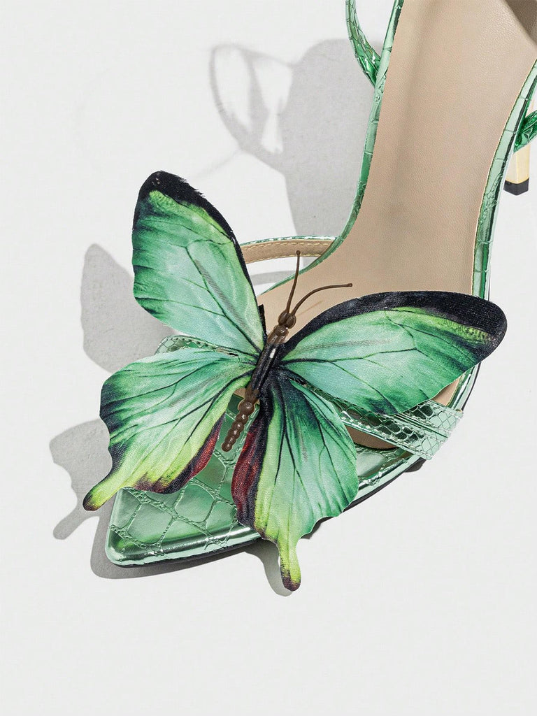 Grüne Sandalen mit Knöchelriemen und Schmetterling