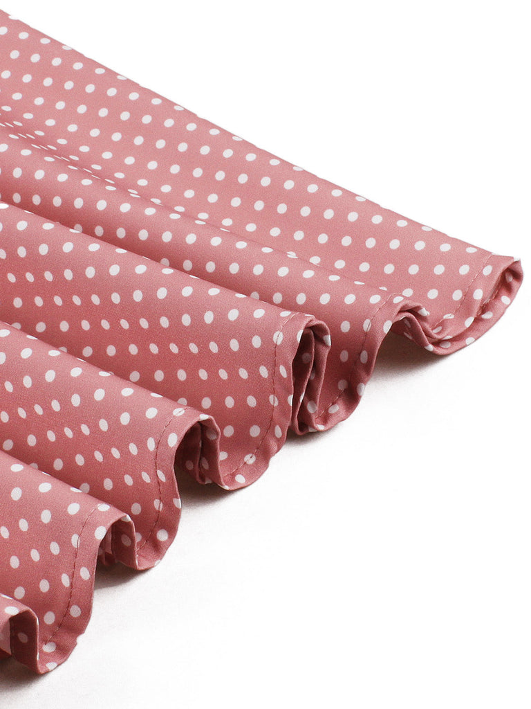 Rosa 50er Swingkleid mit Polka-Dots und Schleife