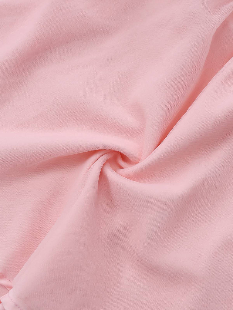 Nahaufnahme von rosa Stoff mit Falten