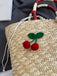 Retro-Strohtasche mit Kirschapplikation, Schleife und Kordelzug – Vintage-Mode, Retro-Stil