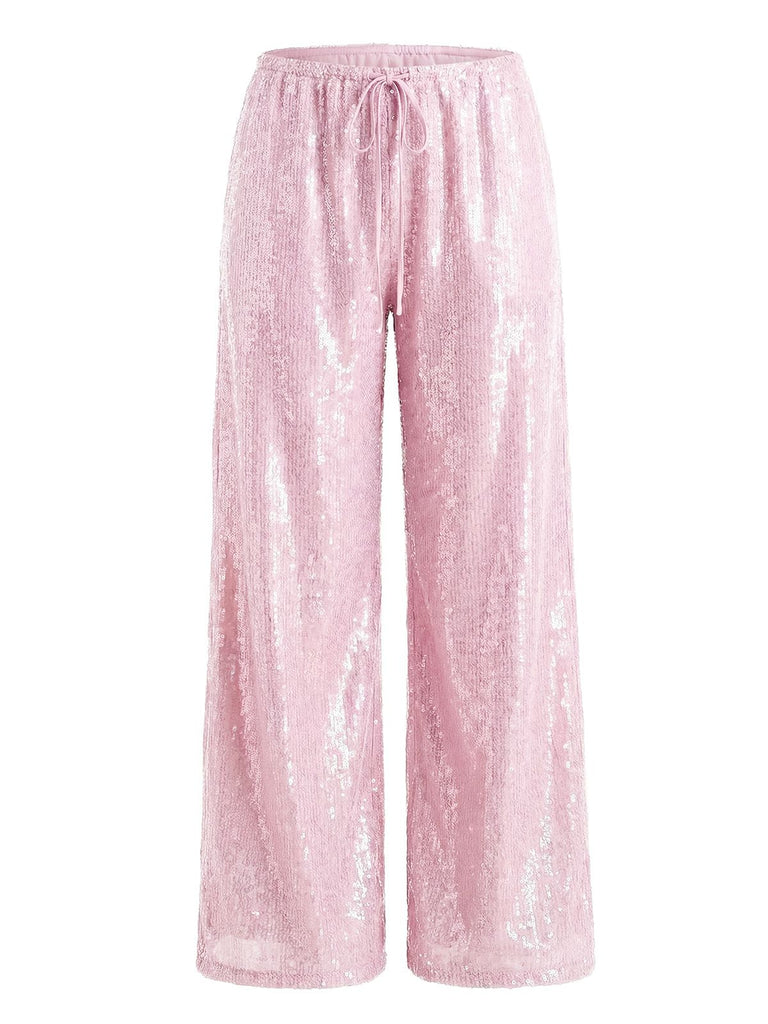 Rosa Paillettenhose auf weißem Hintergrund