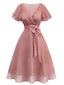 Rosa 50er Cocktailkleid aus Tüll mit Satingürtel