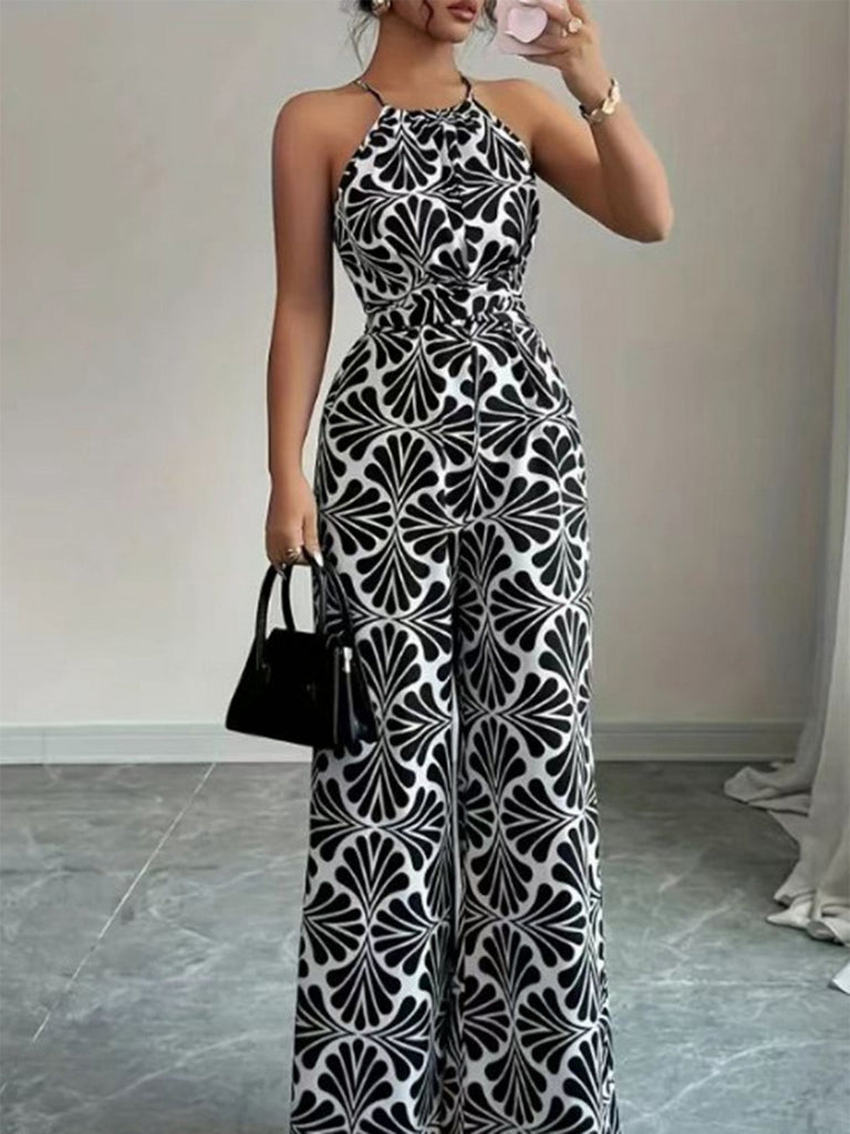 Schwarzer Jumpsuit mit Neckholder, abstraktem Muster und Gürtel im Stil der 1930er Jahre, Größe 5