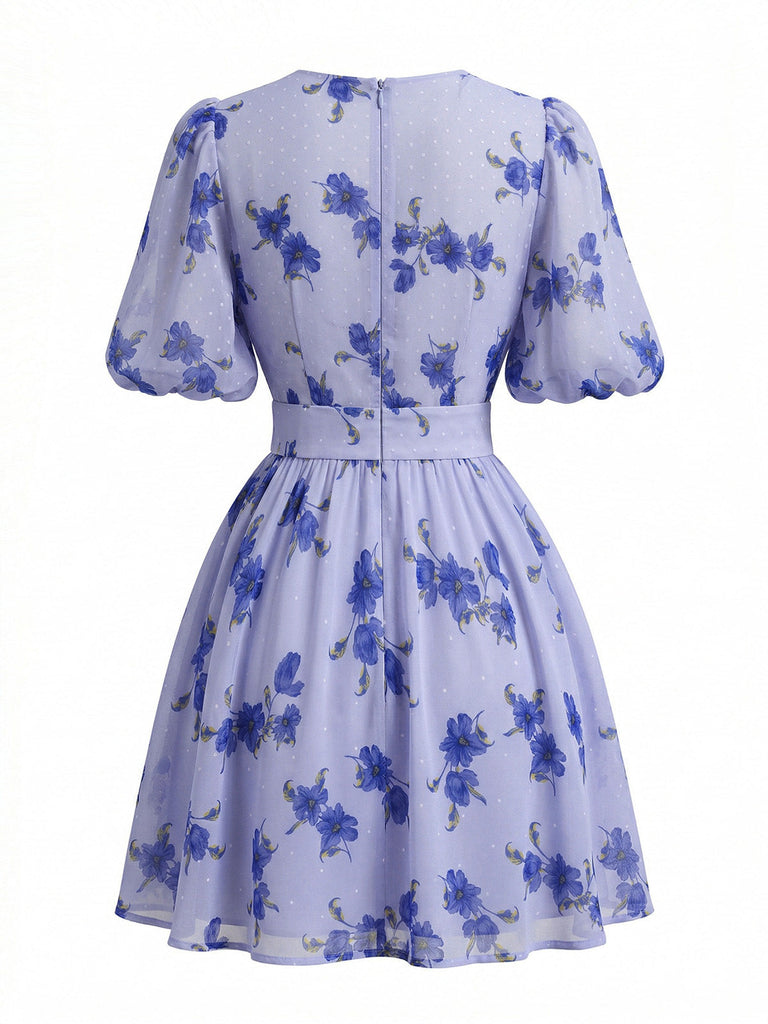 Blaues 50er Kleid mit Puffärmel und V-Ausschnitt