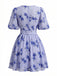 Blaues 50er Kleid mit Puffärmel und V-Ausschnitt