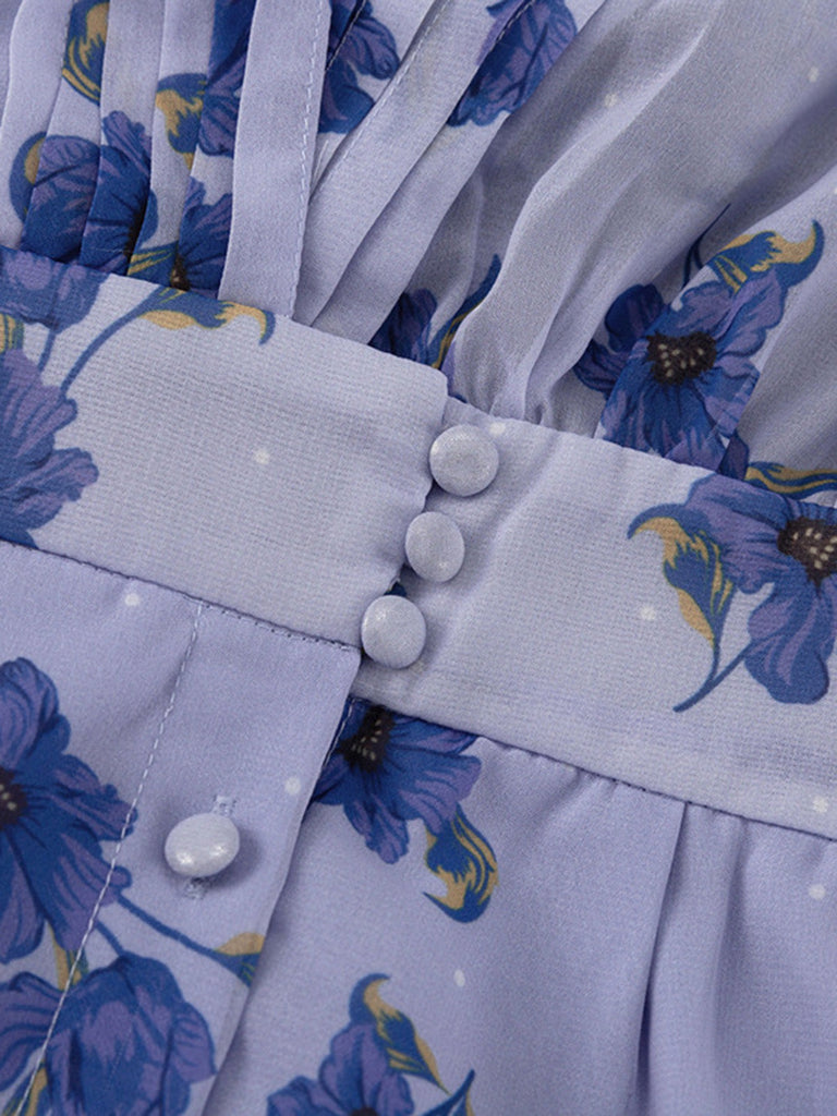 Blaues 50er Kleid mit Puffärmel und V-Ausschnitt