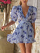 Blaues 50er Kleid mit Puffärmel und V-Ausschnitt