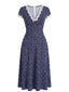 Dunkelblaues 40er Kleid mit V-Ausschnitt und Blumen