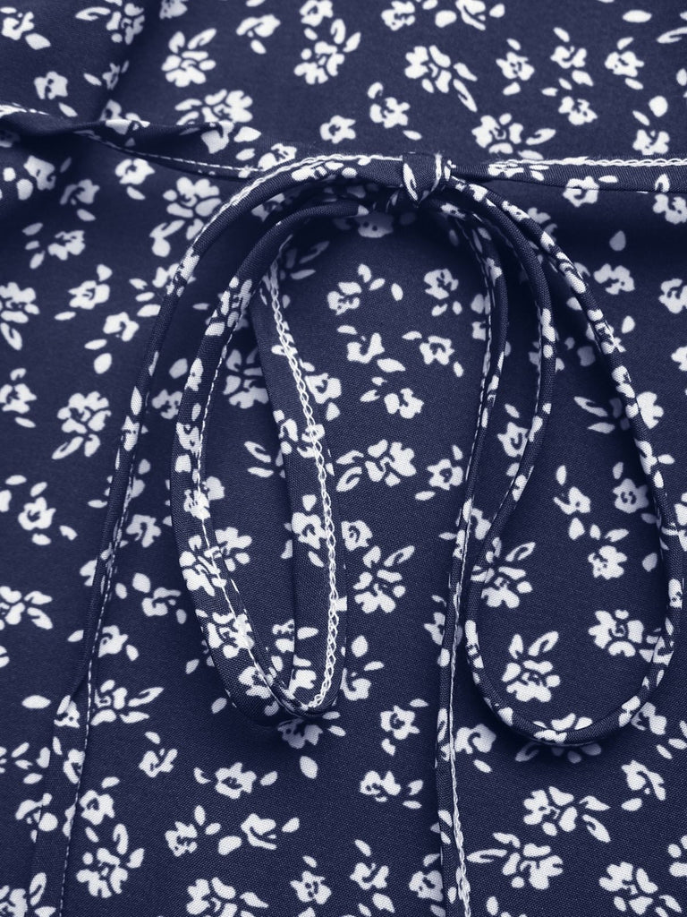 Dunkelblaues 40er Kleid mit V-Ausschnitt und Blumen