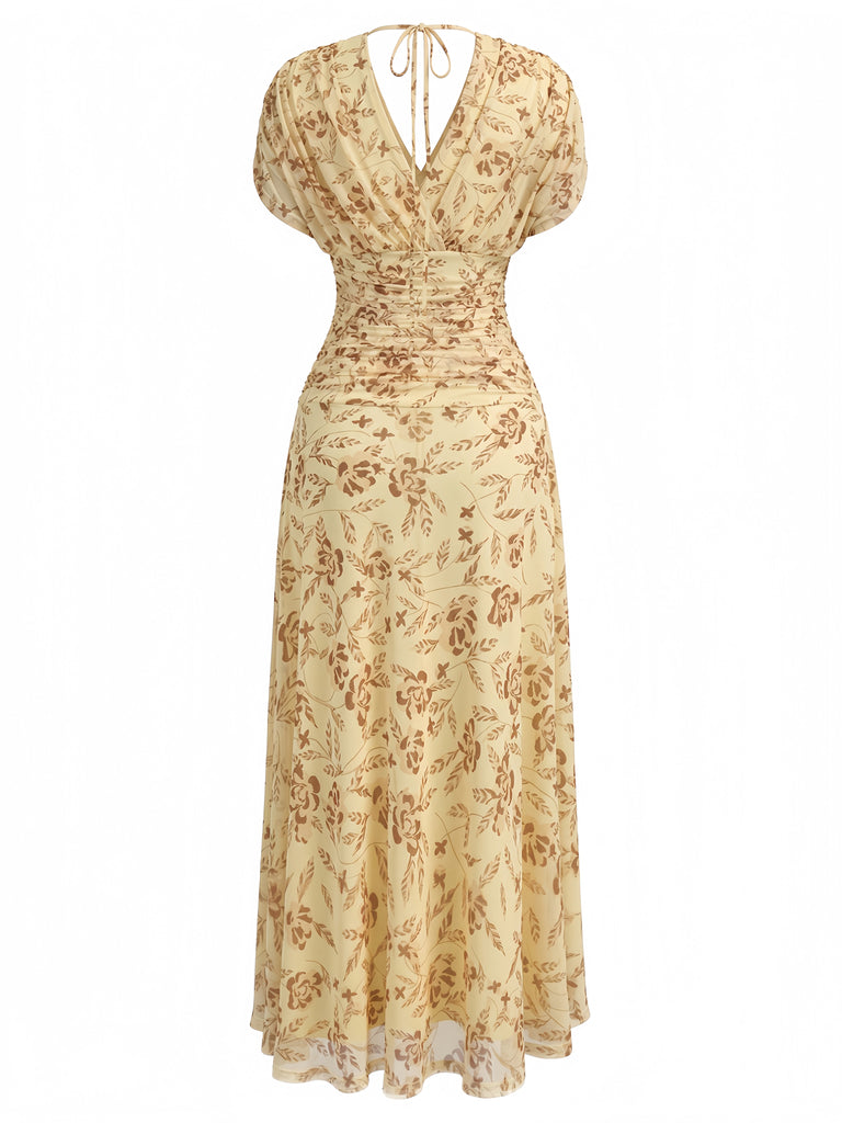 Gelbes 40er Midikleid mit Blumen und Puffärmeln