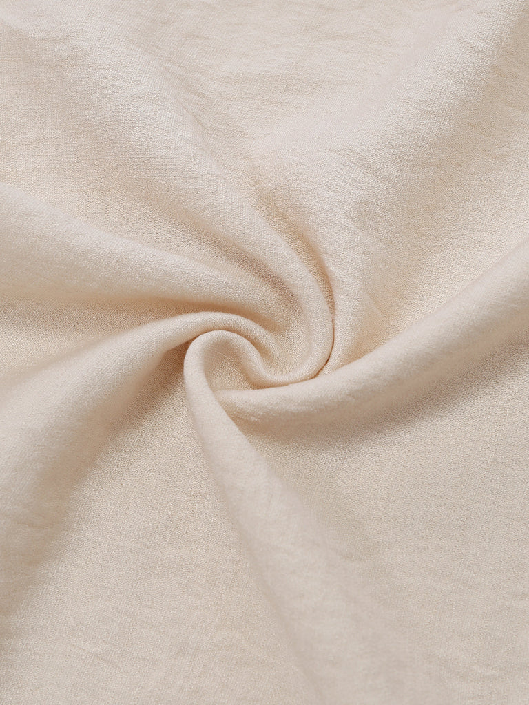 Beiger 70er Jumpsuit mit Häkelspitze und Fransenbesatz