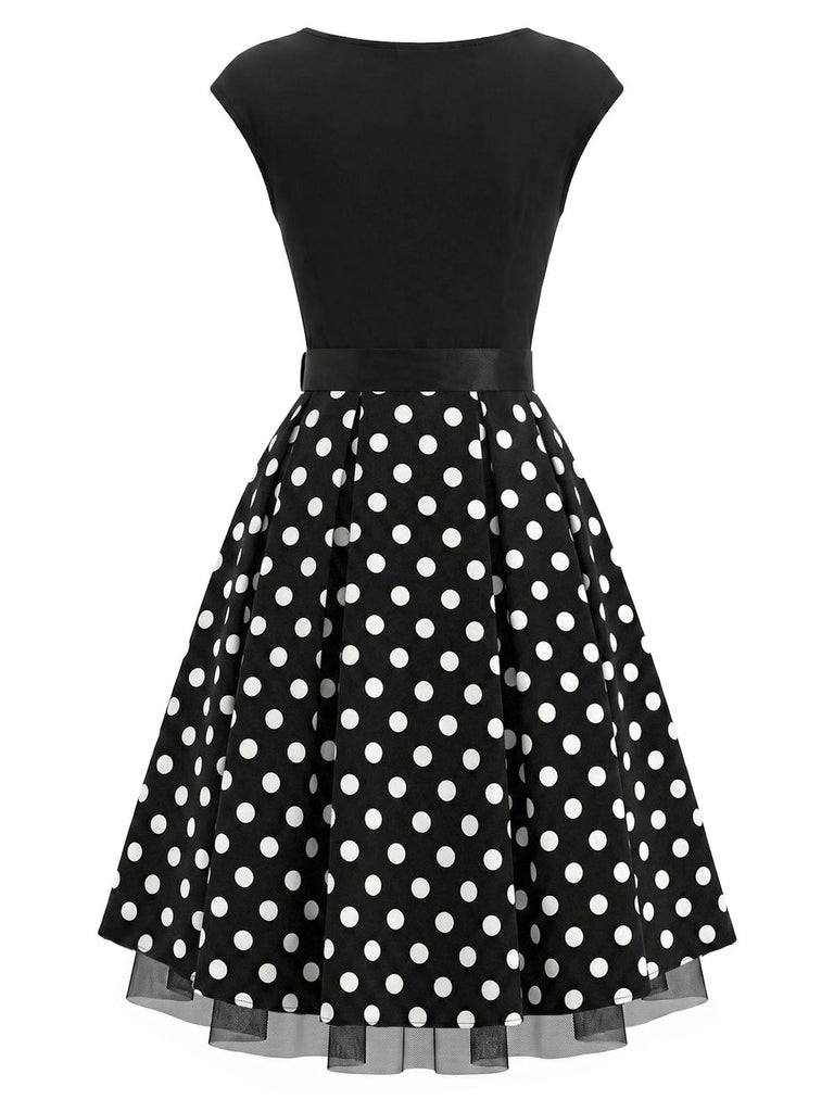 Schwarzes 50er Strick-Swingkleid mit Kappärmel und Polka-Dots