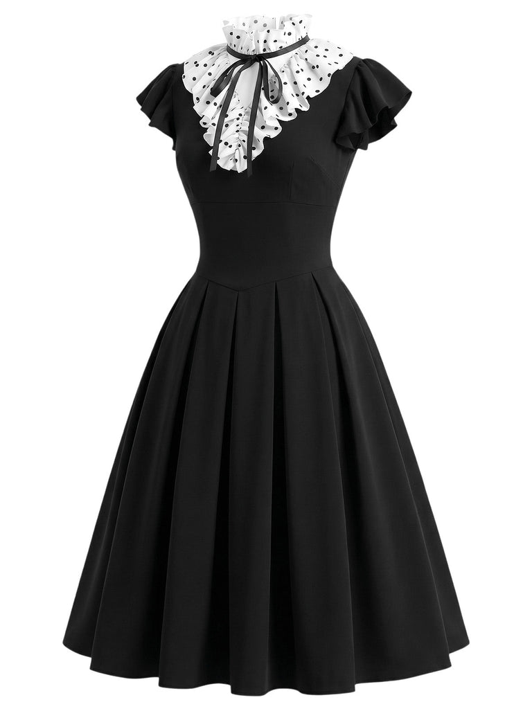 Schwarzes 50er Kleid mit Polka-Dots und Rüschen