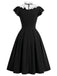Schwarzes 50er Kleid mit Polka-Dots und Rüschen
