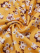 Gelbes 50er Kleid mit Streublumen und Neckholder