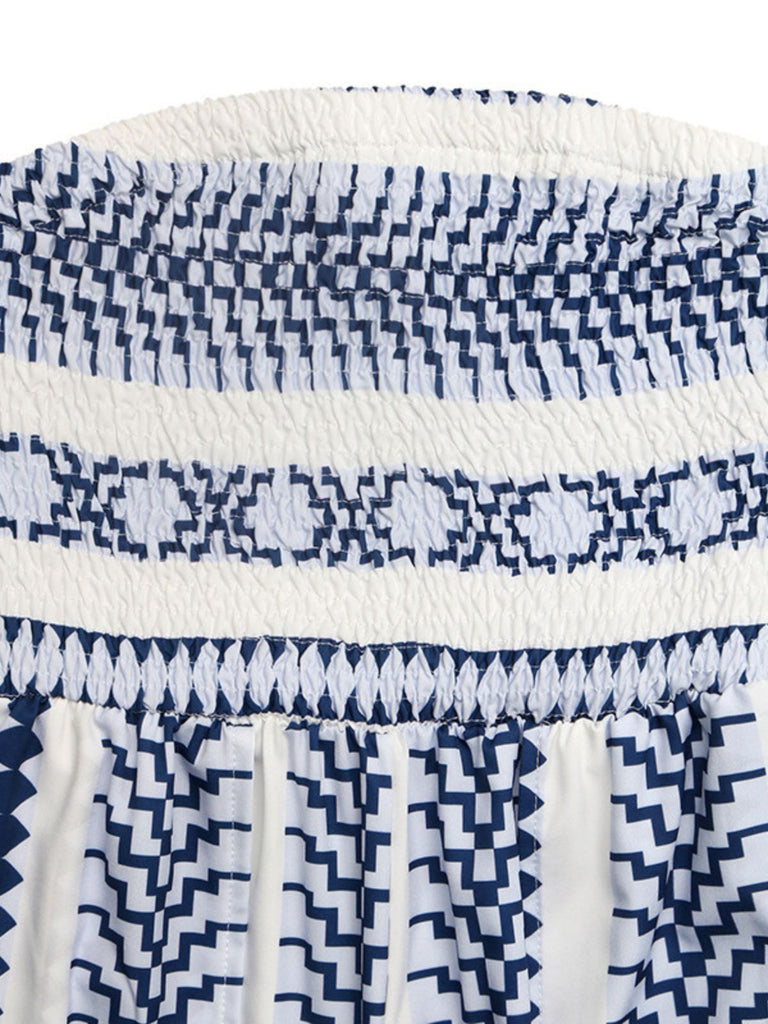 Blauer 70er trägerloser Jumpsuit mit geometrischem Print