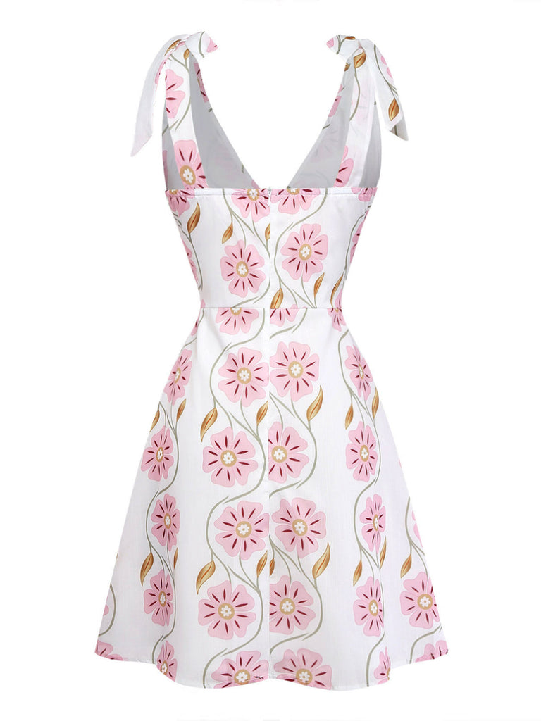 Rosa 60er Kleid mit Spaghettiträger und Blumen