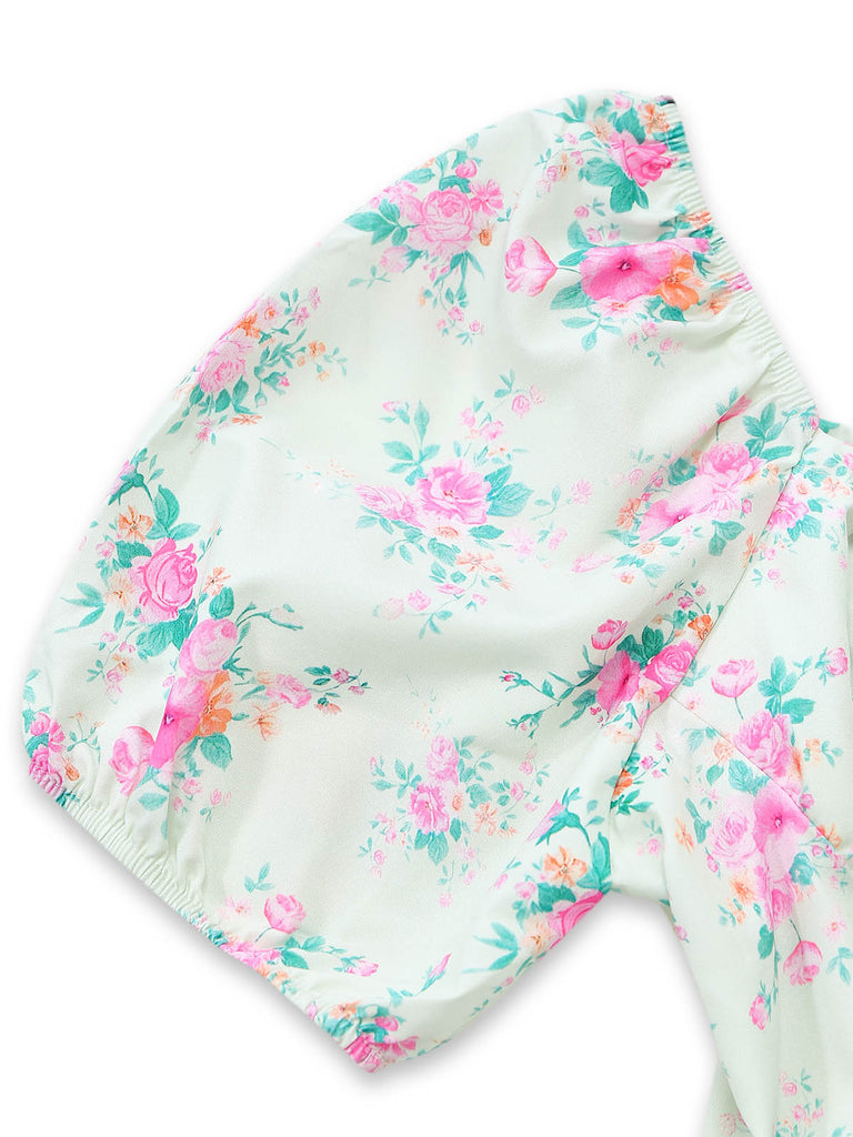Grünes 50er Kleid mit Streublumen und Puffärmel