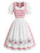 Rosa 50er Kleid mit Schürze und Karo