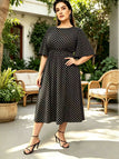 [Übergröße] Schwarzes 60er Midikleid mit Polka-Dots und Runden