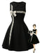 Schwarzes 50er Kleid mit apricotfarbenem Spitzenbesatz und Schleife