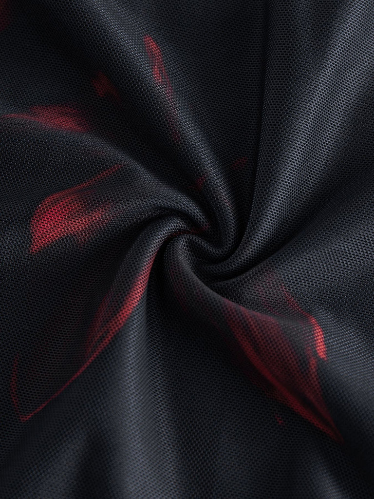 Schwarzes 40er Netzkleid mit roten Lilien und Rüschen