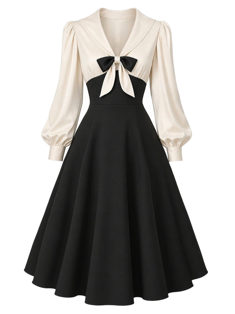 Creme-schwarzes 50er Kleid mit Schleife und Ballonärmeln