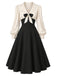 Creme-schwarzes 50er Kleid mit Schleife und Ballonärmeln