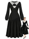 Schwarzes 50er Kleid mit transparentem Spitzenkragen und Schleife