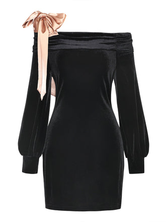 Schwarzes 60er Kleid mit Schulterschleife und betonter Taille