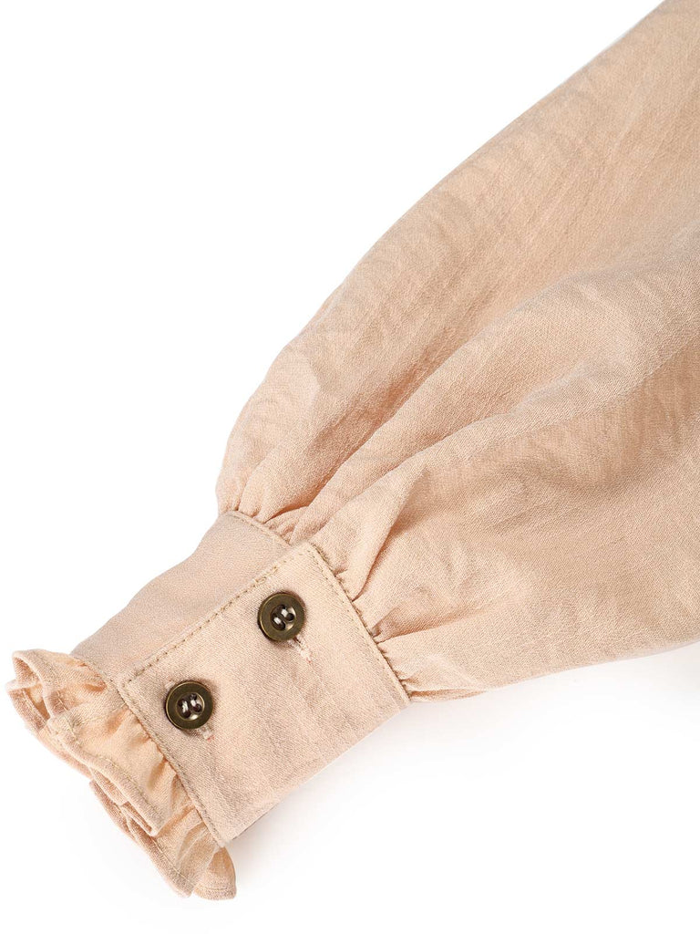 70er Bluse mit Ballonärmeln & Latzhose mit Bortenbesatz